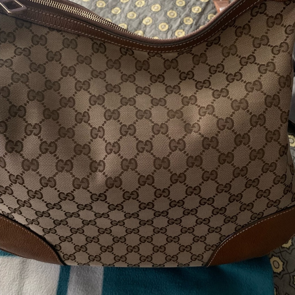 Authentic Gucci hobo handbag. Brown and tan.